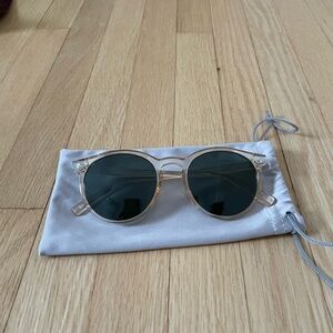 Clear Frame Round Sunglasses with Dark Green Lenses
